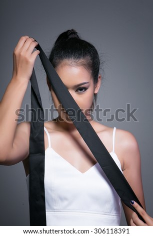 women bind necktie