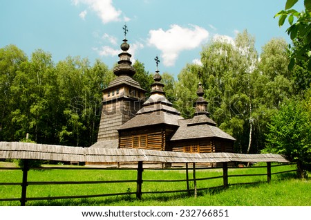 An old wooden Orthodox church moved from a nearby village in the folk architecture \