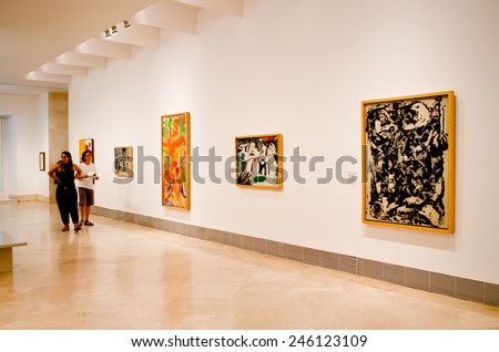 MADRID, SPAIN - AUGUST 26: Visitors in the museum Thyssen-Bornemisza.  The museum remains to one of significant objects in Madrid on August 26, 2014 in Madrid, Spain