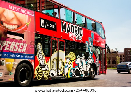 MADRID, SPAIN - AUGUST 9: The tourist bus in Madrid. Madrid the largest tourist center of Spain on August 9, 2014 in Madrid, Spain