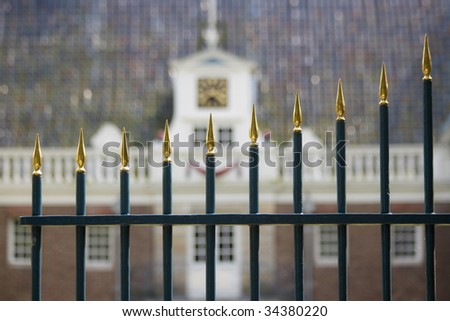 Entrance gate with golden points to castle