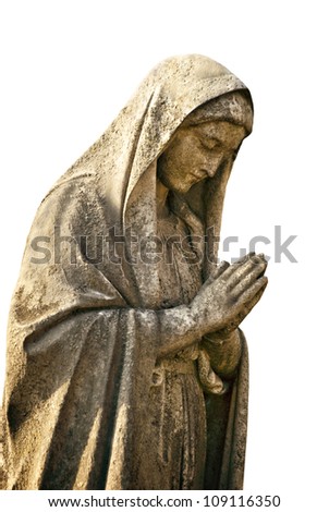 An old cemetery statue of Mother Mary with her head bowing in prayer, isolated on vertical white background with copy space.