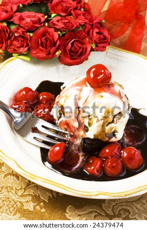 stock-photo-brownie-topped-with-vanilla-ice-cream-chocolate-syrup-and-cherry-topping-great-for-valentine-s-day-24379474.jpg