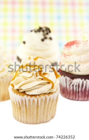 Assorted holiday cupcakes with selective focus on front cupcake