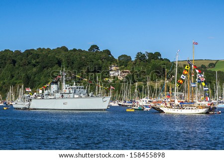 DARTMOUTH, UNITED KINGDOM - AUGUST 31: Royal Navy Vessel M37 HMS Chiddingfold acting as Flagship for the Dartmouth Royal Regatta on August 31 2013 at Dartmouth, UK