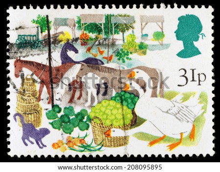 UNITED KINGDOM - CIRCA 1983: A used postage stamp printed in Britain celebrating British Fairs showing Early Produce Fair