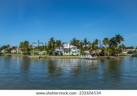 NAPLES, FLORIDA USA - May 8 2013: Luxury waterside home in the bayside area of Naples. Naples is one of the wealthiest cities in the United States