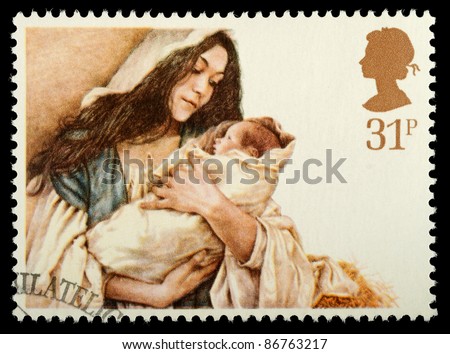 UNITED KINGDOM - CIRCA 1984: A stamp printed in the United Kingdom shows a Christmas postage stamp with Virgin Mary and Baby Jesus, circa 1984