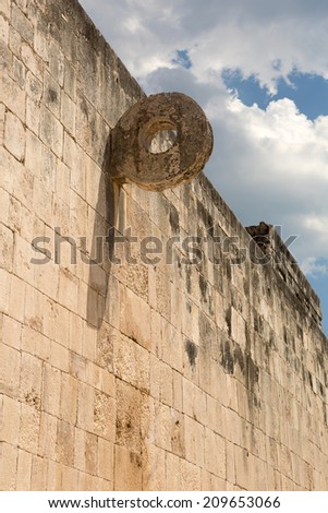 Mayan ball court ring on stone wall
