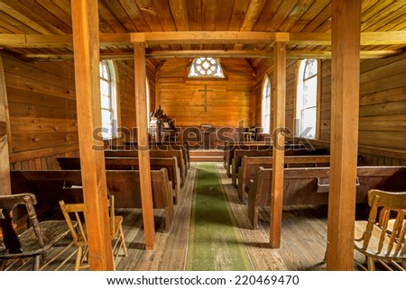 wide angle view of an old wooden mining town church interior in British Columbia ,Canada