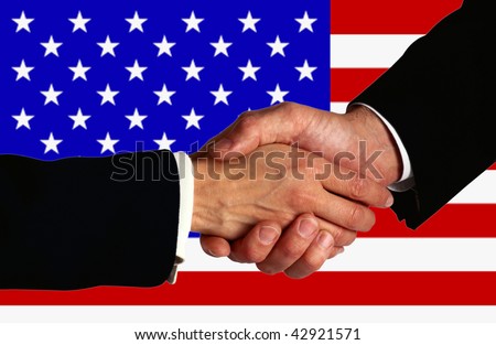 Business man shake hands after signing a contract