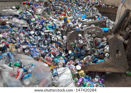 FAIRFAX, VA - JULY 24: Aluminum cans lying in a heap at an undisclosed recycling facility on July 24, 2013 in Fairfax, VA. The cans will be sent to an aluminum foundry.