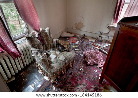 Urbex - Living room of an abandoned and dirty house in light HDR processing