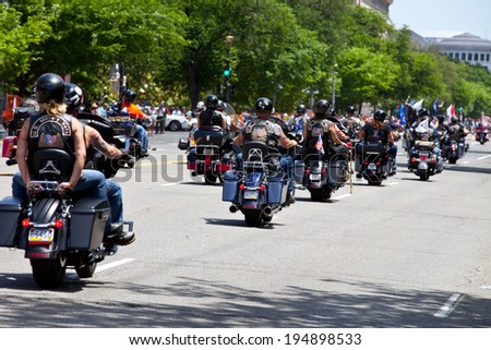 WASHINGTON, DC - MAY 25: Motorcycles travel in DC as part of the annual Rolling Thunder motorcycle Ride for FreedomÃ?Â� for American POWs and MIA soldiers on May 25, 2014 in Washington, DC.