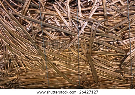 A bale of compressed copper tubes for recycling
