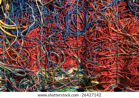 A bale of recycling communication cables. There is a mix of plastic and copper to recover.