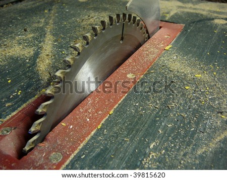table saw with sawdust