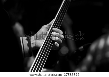 Detail of bass player\'s hand