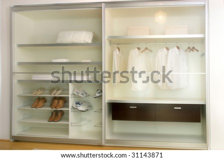 clothes organized in closet