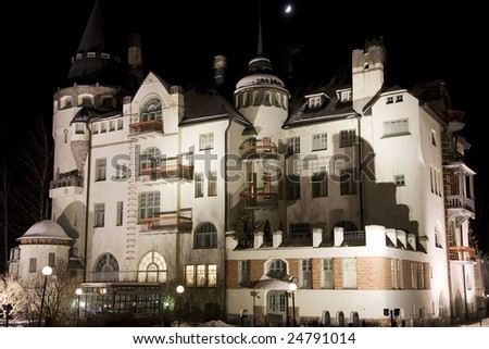 Old jugend castle called Valtionhotelli by night. Moonlight.