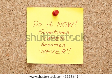 Do it Now, written on an yellow sticky note on a cork bulletin board