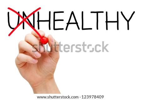 Hand turning the word Unhealthy into Healthy with red marker isolated on white Hand turning the word Unhealthy into Healthy with red marker isolated on white