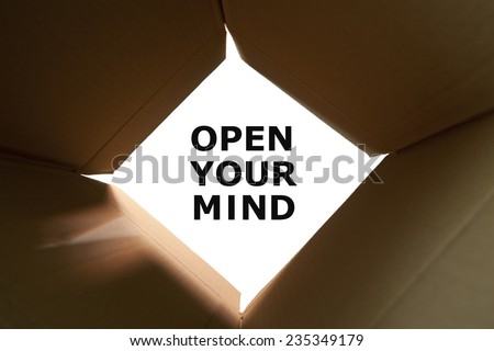 Open cardboard box with text Open Your Mind on white background.