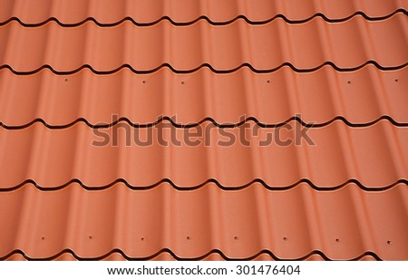 Red Roof tiles. Picture can be used as a background