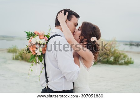 Kiss the bride and groom