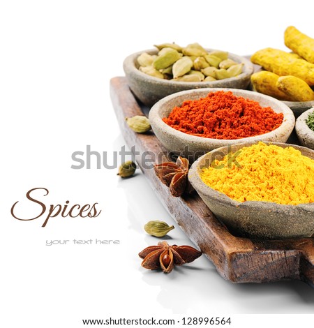 Colorful Mix Of Spices Isolated Over White