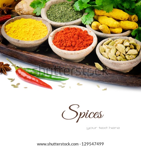 Colorful mix of spices isolated over white