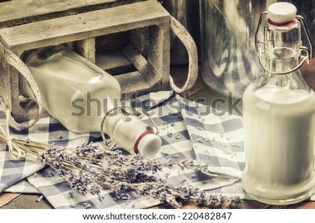 Rustic setting with fresh milk bottles and lavender