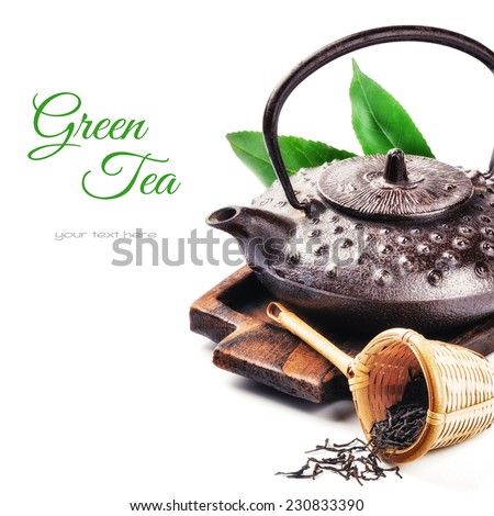 Closeup of asian teapot and dried tea. Health and diet concept