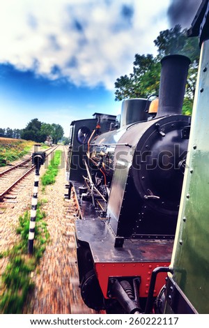 Historical steam engine train in motion