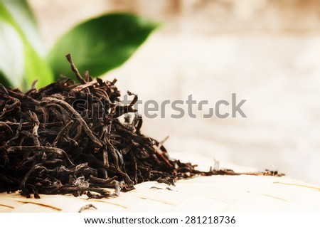 Closeup of dry black tea. Health and diet concept