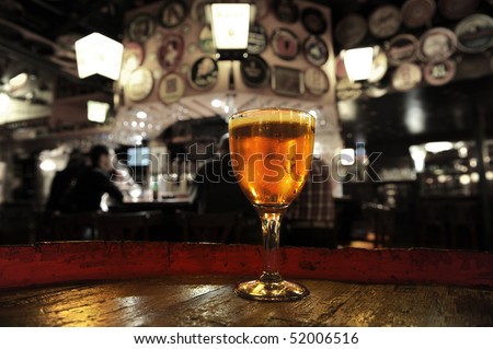 Glass of fresh beer  Delirium bar Brussels