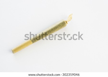 A single joint (marijuana cigarette) that has a translucent rolling paper