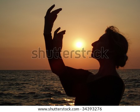 Silhouette of a ballet girl at the sea