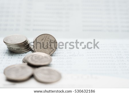 Double exposure hand with stack of coins and utility bill with calculator and account banking for finance, Money and finance concept