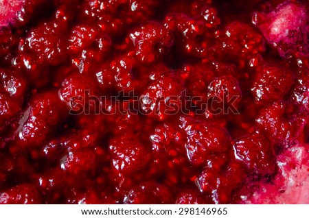 Texture of red raspberry jam food theme background