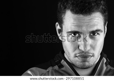 Rugby Player crop shot wet face black and white