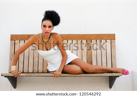 Portrait of a young black woman, model of fashion, with fantasy make up made by a professional beautician