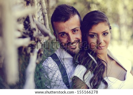 Just married couple together in nature background