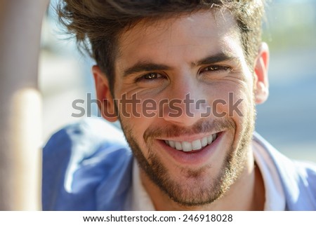 Portrait of a young handsome man smiling