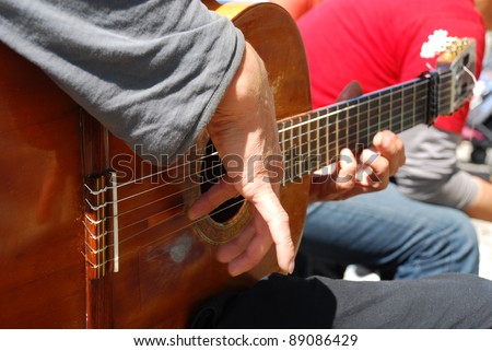 Man playing the Spanish guitar