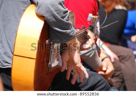 Man playing the Spanish guitar in Albaicin, Granada, Spain