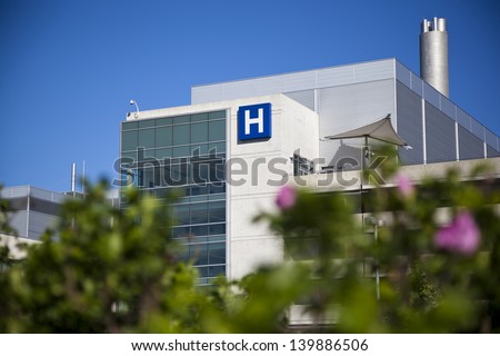 Modern Hospital And Sign With Clear Blue Sky Taken In Brampton Ontario Canada