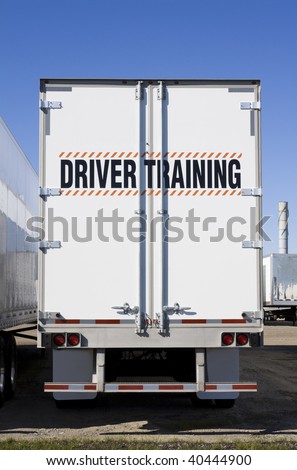 Driver training sign on back of truck