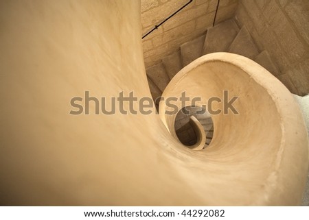 Architectural details of the spiral of stairs in a historical building