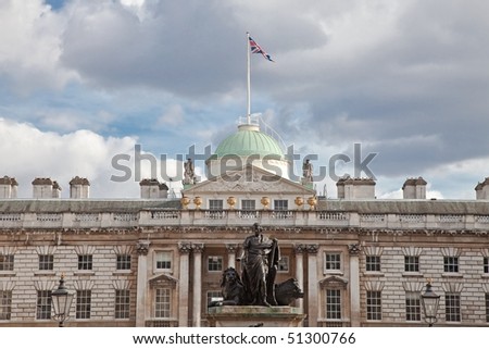 Historical Somerset House, one of the major art and culture center in London England background in blue sky